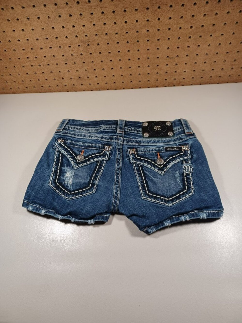 Miss Me womens dark wash rips stretch flap signature jean shorts 27